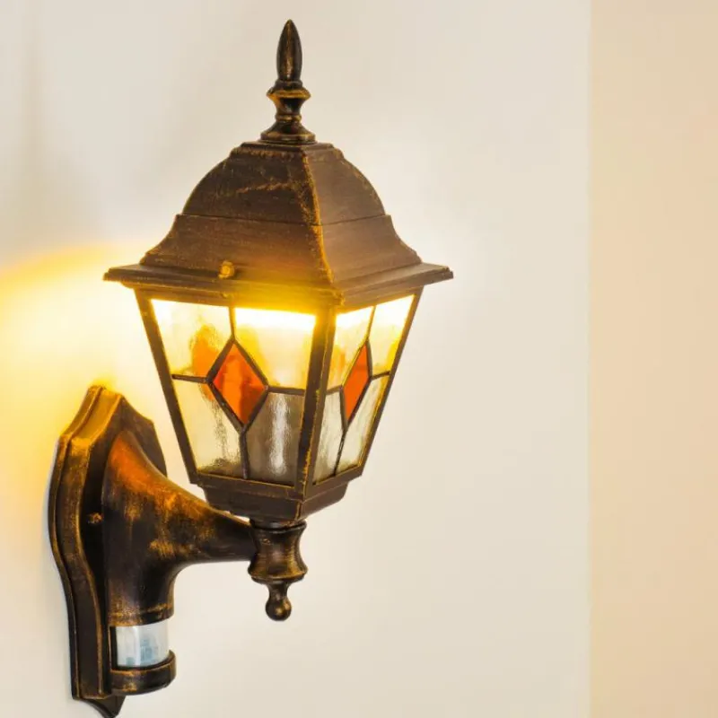 Luminaires Rustiques-hofstein Applique murale d'extérieur Antibes Brun doré, 1 lumière, Détecteur de mouvement