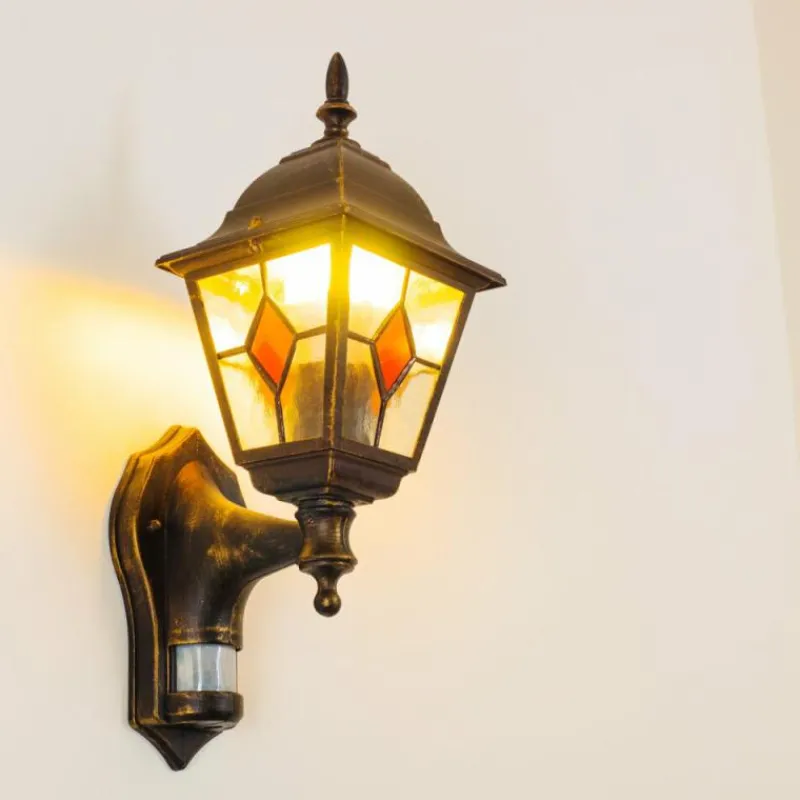 Luminaires Rustiques-hofstein Applique murale d'extérieur Antibes Brun doré, 1 lumière, Détecteur de mouvement