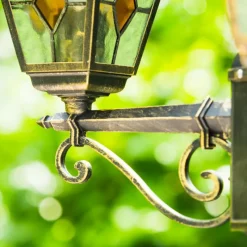 Luminaires Rustiques-hofstein Réverbère Antibes Brun doré, 3 lumières