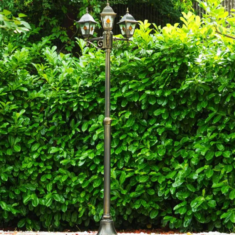 Luminaires Rustiques-hofstein Réverbère Antibes Brun doré, 3 lumières