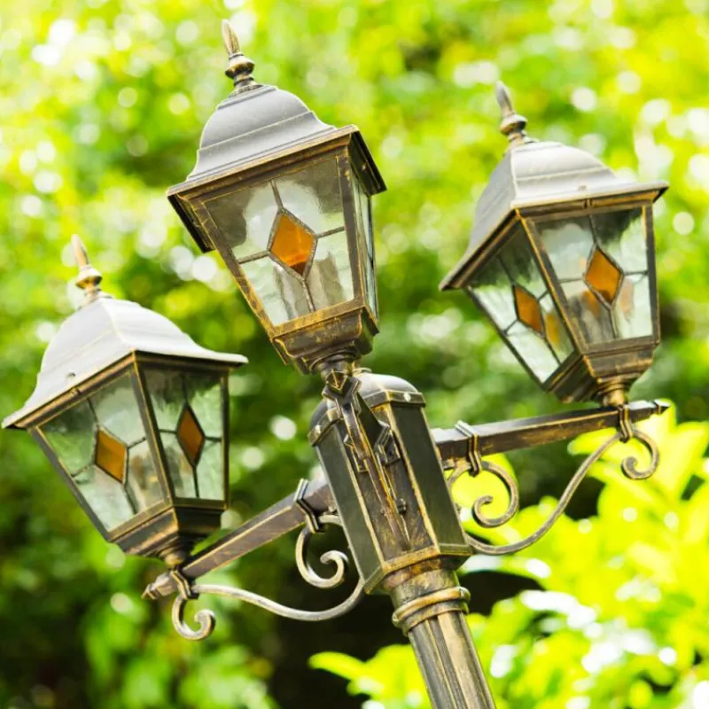 Luminaires Rustiques-hofstein Réverbère Antibes Brun doré, 3 lumières