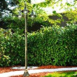 Luminaires Rustiques-hofstein Réverbère Elgin Brun doré, 3 lumières