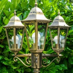 Luminaires Rustiques-hofstein Réverbère Hong Kong bronze Transparent, 3 lumières