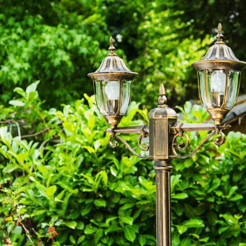 Luminaires Rustiques-hofstein Réverbère Ribadeo Noir doré, 2 lumières