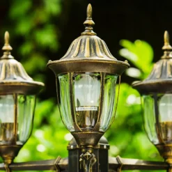 Luminaires Rustiques-hofstein Réverbère Ribadeo Noir doré, 3 lumières